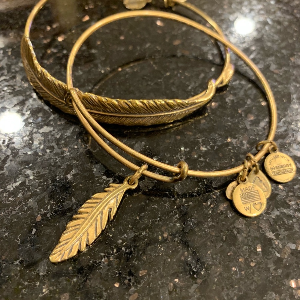 Two Alex and Ani feather bracelets